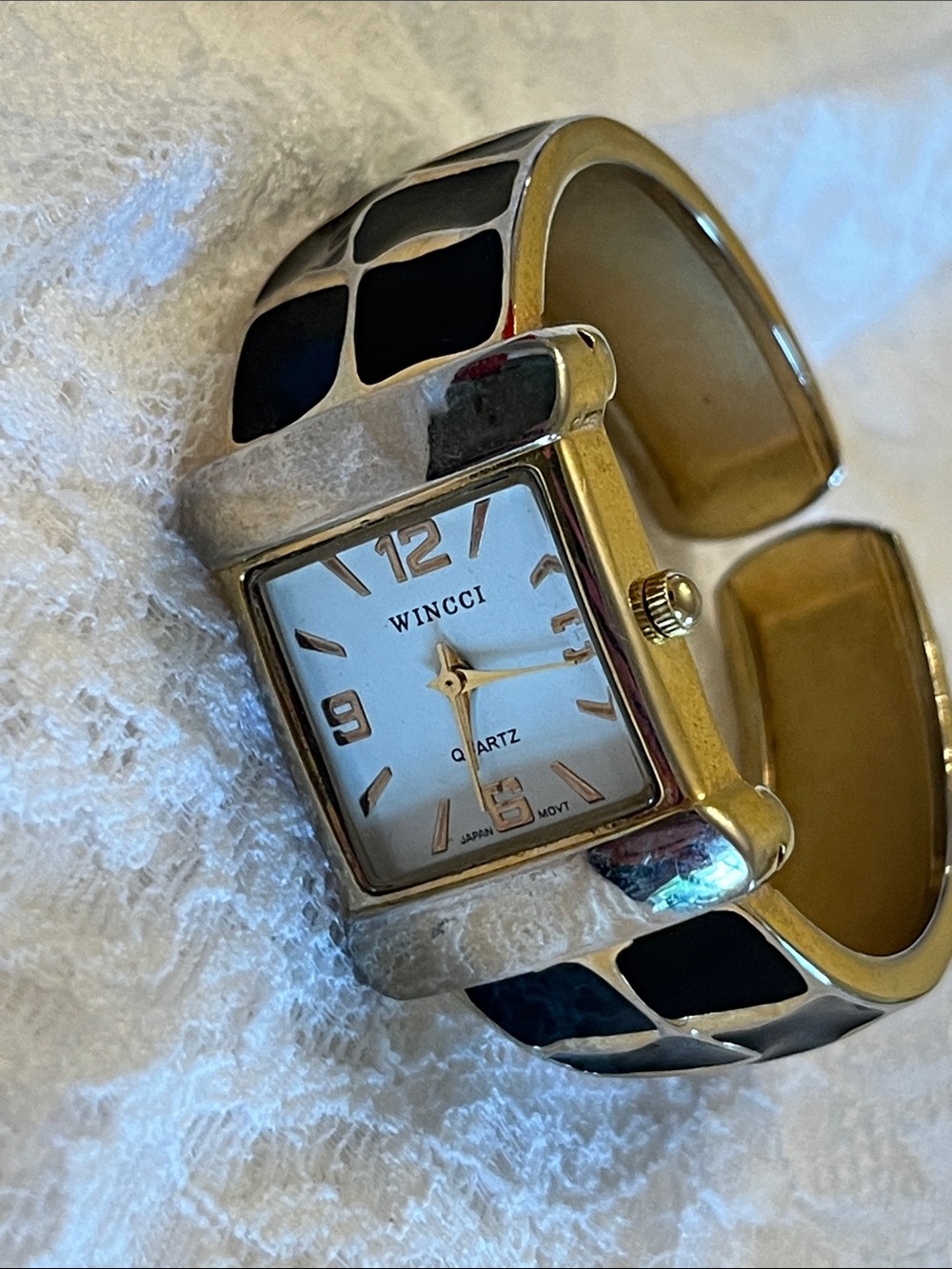 Wincci Gold Tone Cuff Watch with Black Inlay